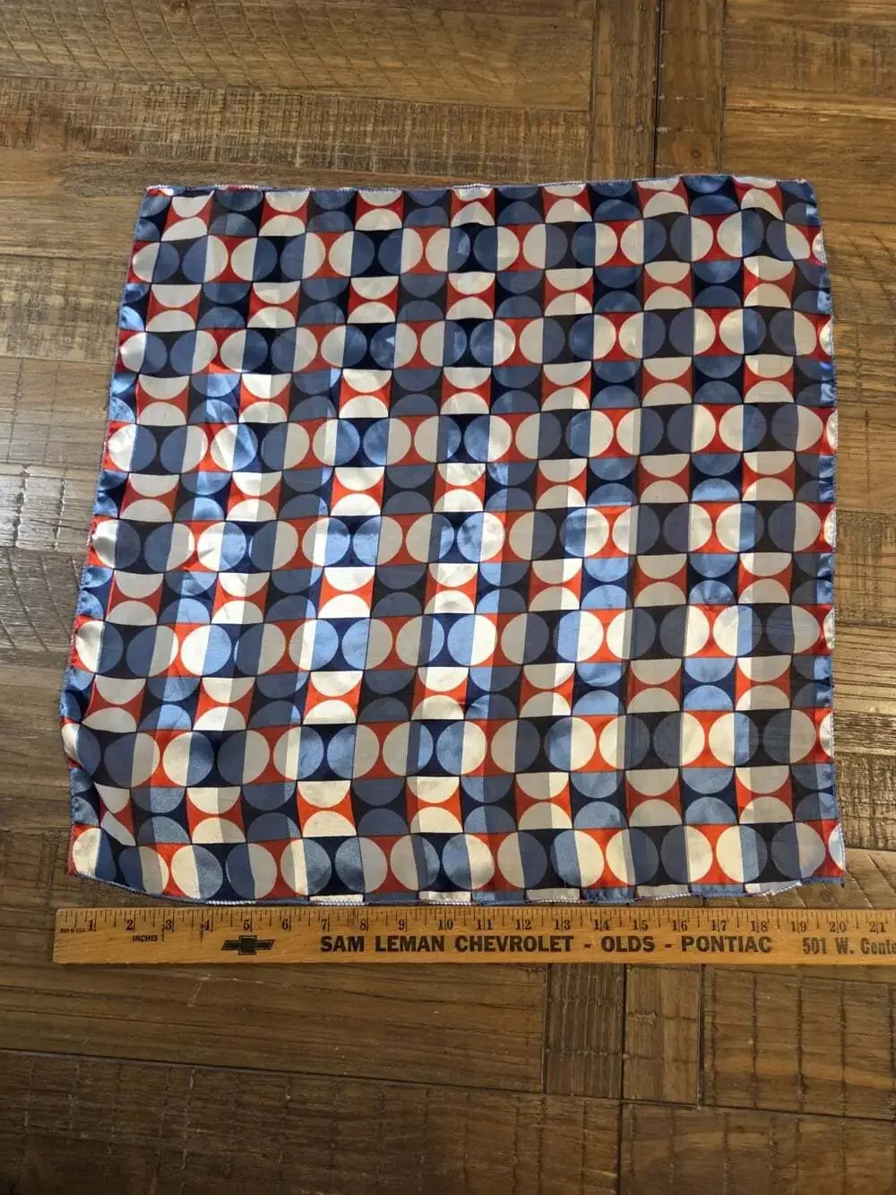 vintage geometric silk scarf features a retro mid-century modern pattern